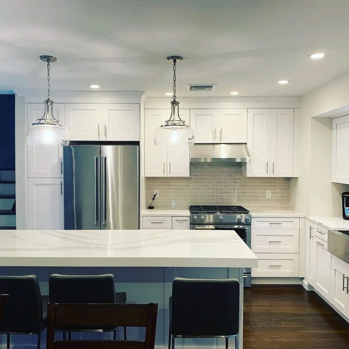 Kitchen remodeling with sleek design and functional layout.